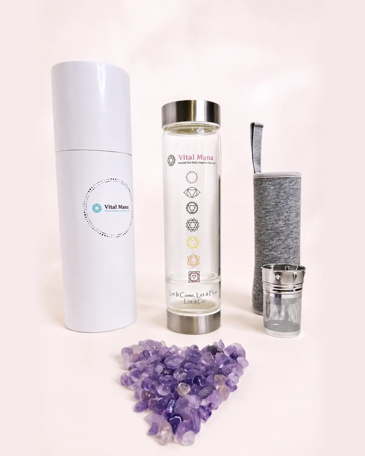 Vital Mana glass tea infuser bottle, stainless steel basket, sleeve, case, and amethyst stones